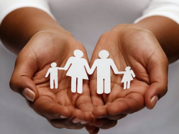 hands holding family cutout